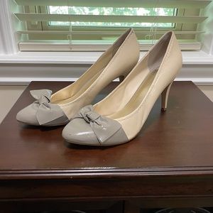 Beige Nine West pumps with gray bow. Used.